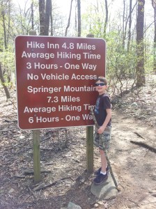 Heading to the Hike Inn with Harris Harris at the beginning of the hike next to the sign.