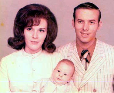 Mom, Dad and their bundle of joy