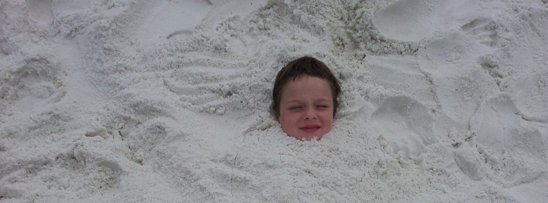 Harris buried in the sand