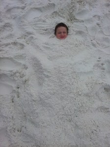 Harris buried in the sand