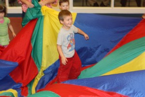 Carlton gets dizzy with the parachute game