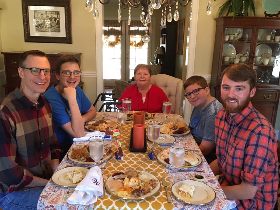 The Wallaces at the Thanksgiving table in 2019.