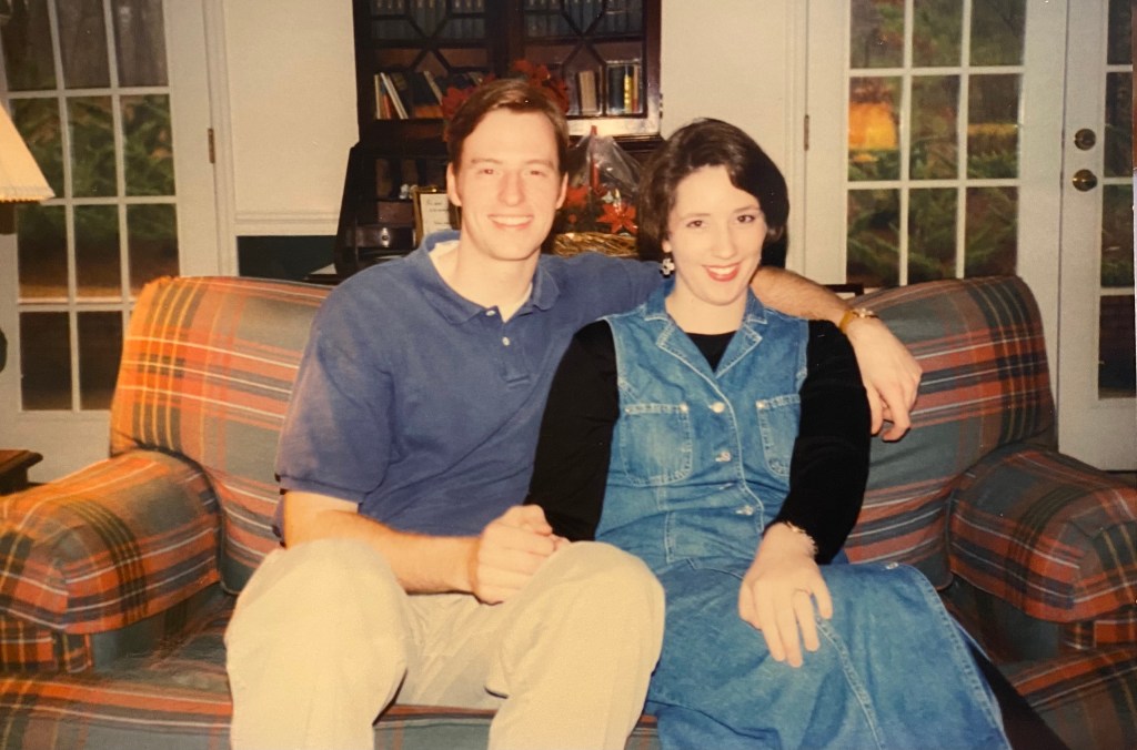 Lance and Carla Wallace sitting on a sofa just after they were engaged