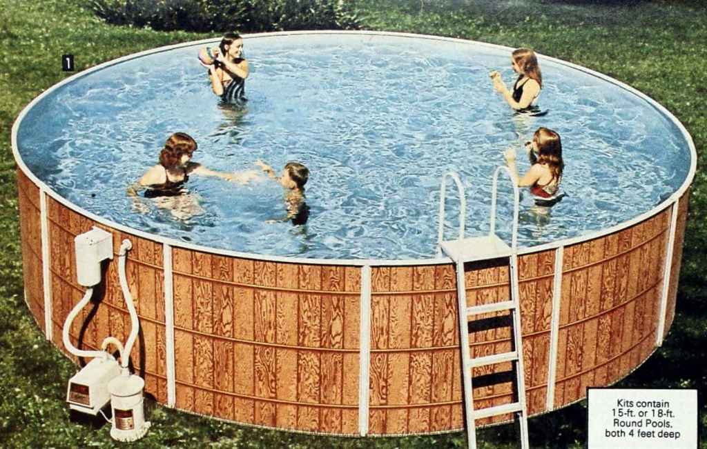 A family frolics in an above ground swimming pool in the 1980s.