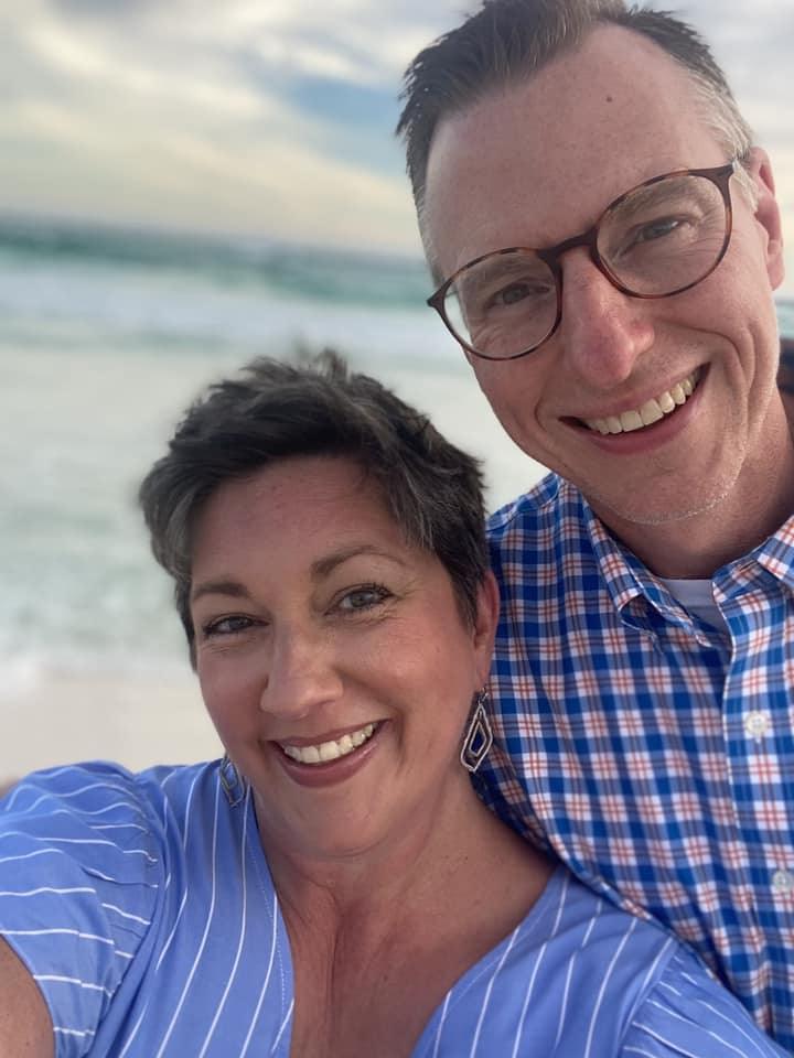 A woman and man on a beach