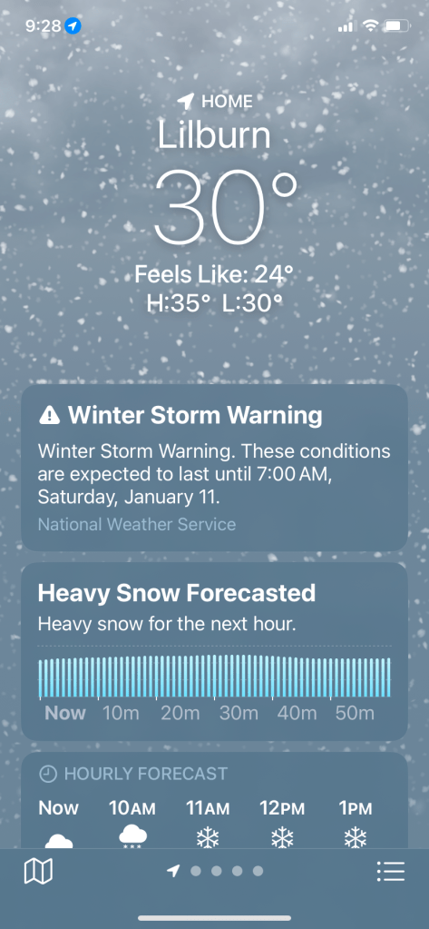 screen shot of weather app showing forecast of snow