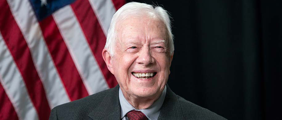 President Jimmy Carter with an American flag in the background
