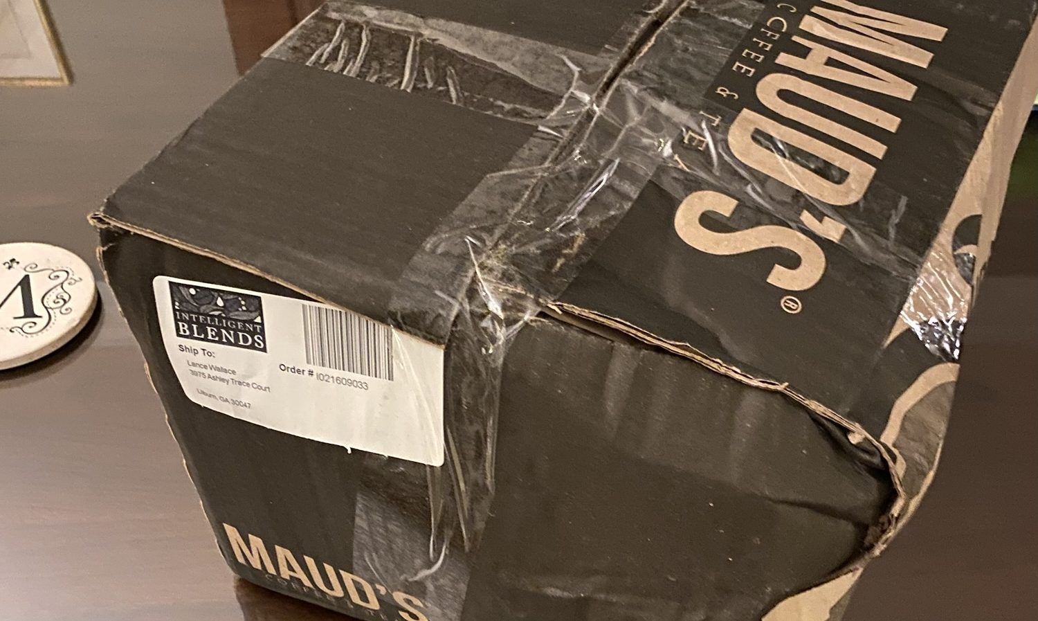 Crumpled box of Maud's coffee pods