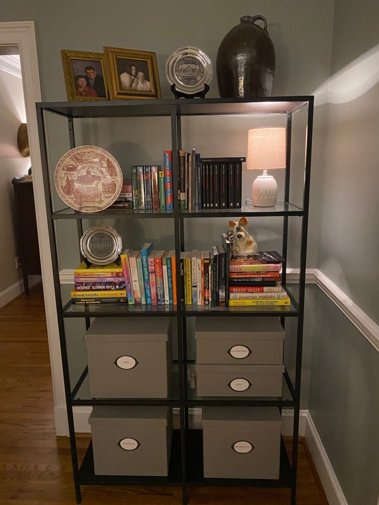 Small lamp on a bookshelf