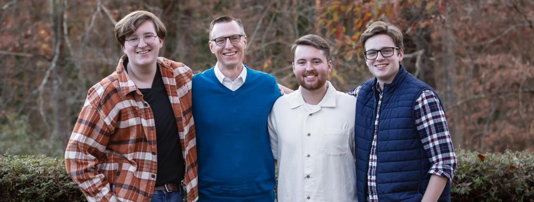 A man and his three grown sons