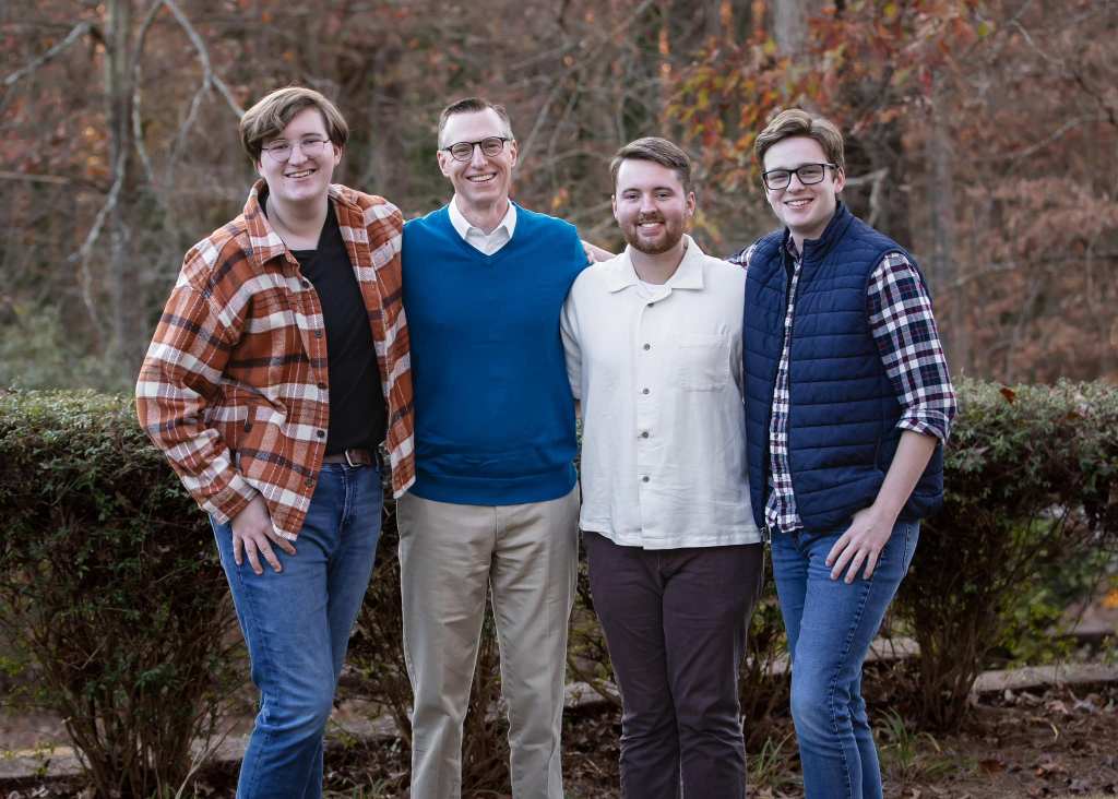 A man and his three grown sons