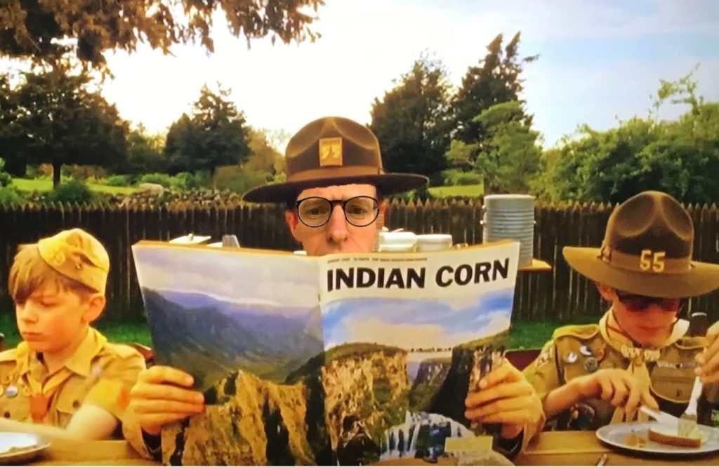 Photoshopped image from Moonrise Kingdom of a scoutmaster with Lance's face eating breakfast with his scouts