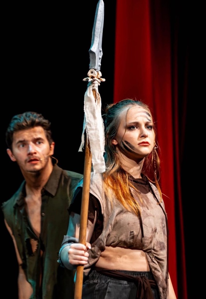 A young woman with a spear