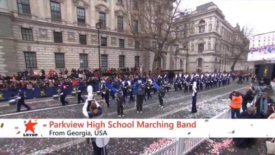 A TV screenshot of the Parkview marching band in London for the New Year's Day parade.