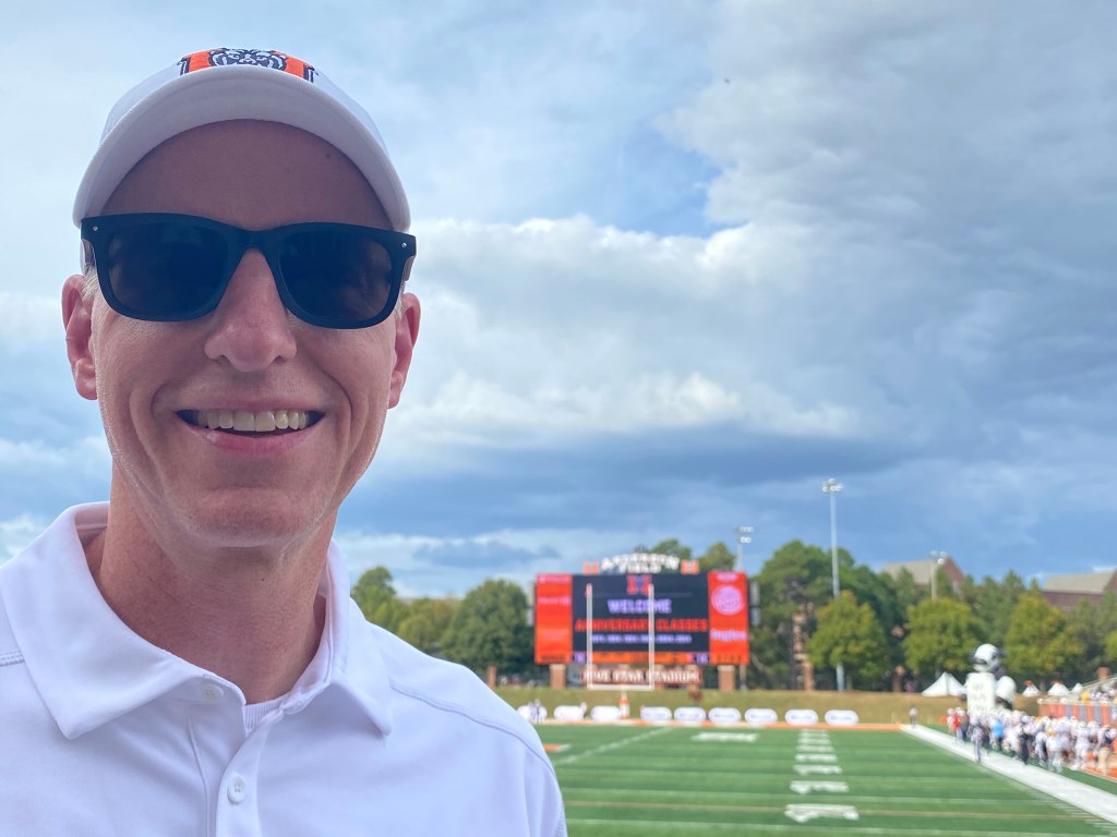 A man at a football stadium
