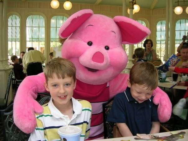 Two young boys with Piglet