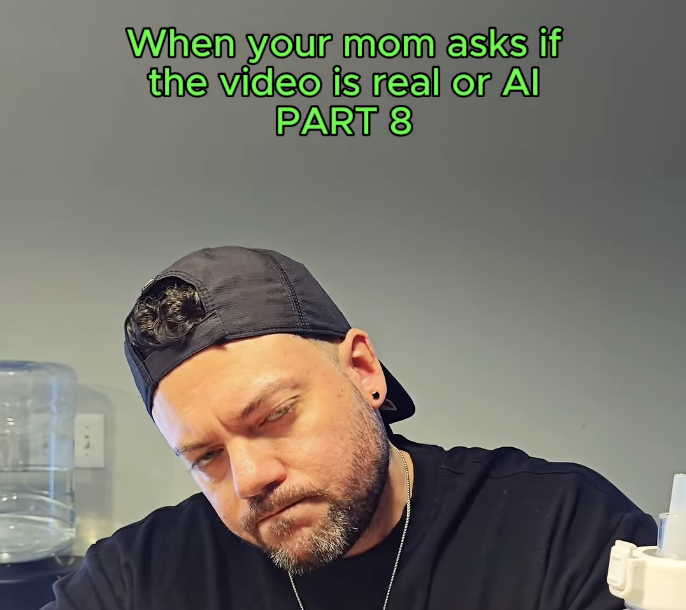 A man in backwards baseball cap looking incredulous with the words "When your mom asks if the video is real" above him